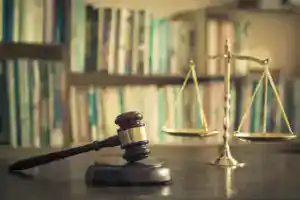 Legal scales and gavel representing law, justice, and legal solutions at Axiom HR.