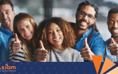 Group of diverse professionals smiling and giving thumbs up, promoting Axiom Human Resource Solutions' commitment to positive workplace culture and effective HR management.