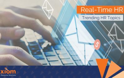 Hands typing on a laptop keyboard with email icons, featuring "Real-Time HR" and "Trending HR Topics" text overlay, related to HR solutions and employee engagement.