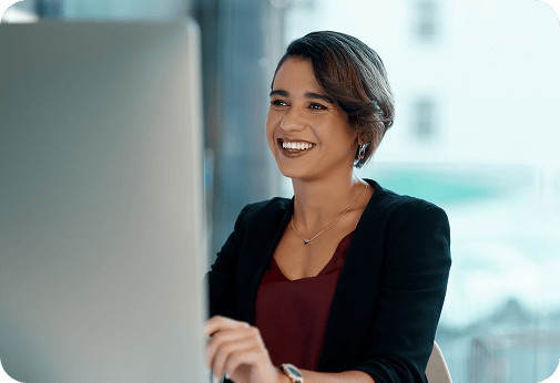 Business professional smiling at computer with text about straightforward payroll and HR software pricing from Axiom HRS.